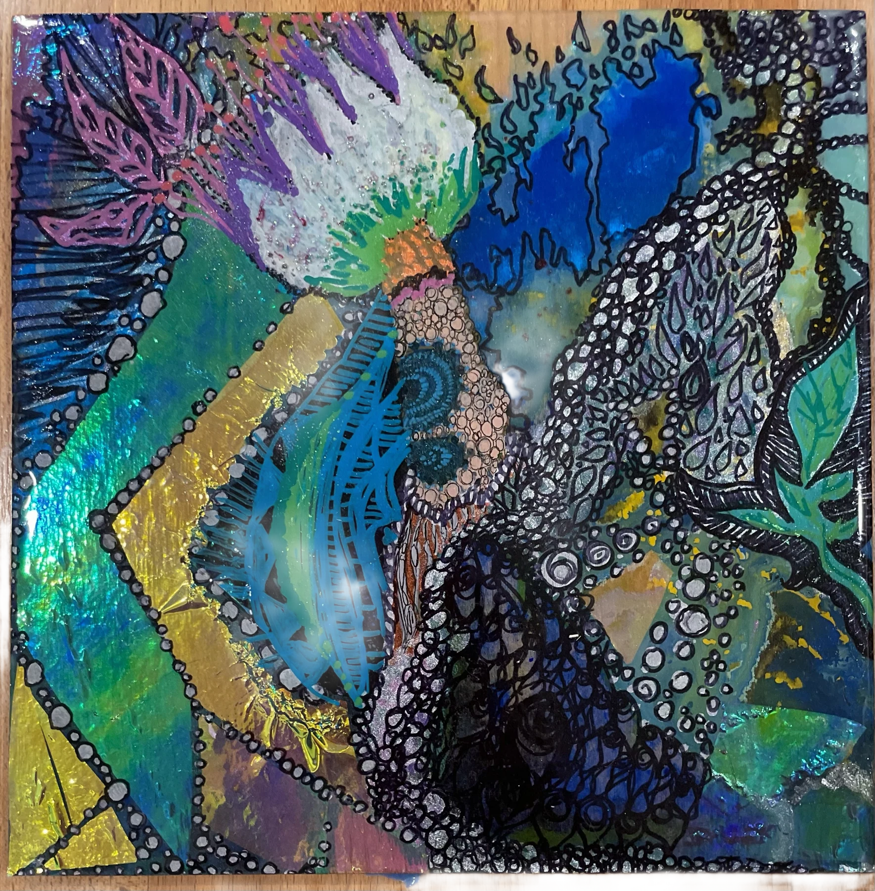 Teal, violet and gold layered forms