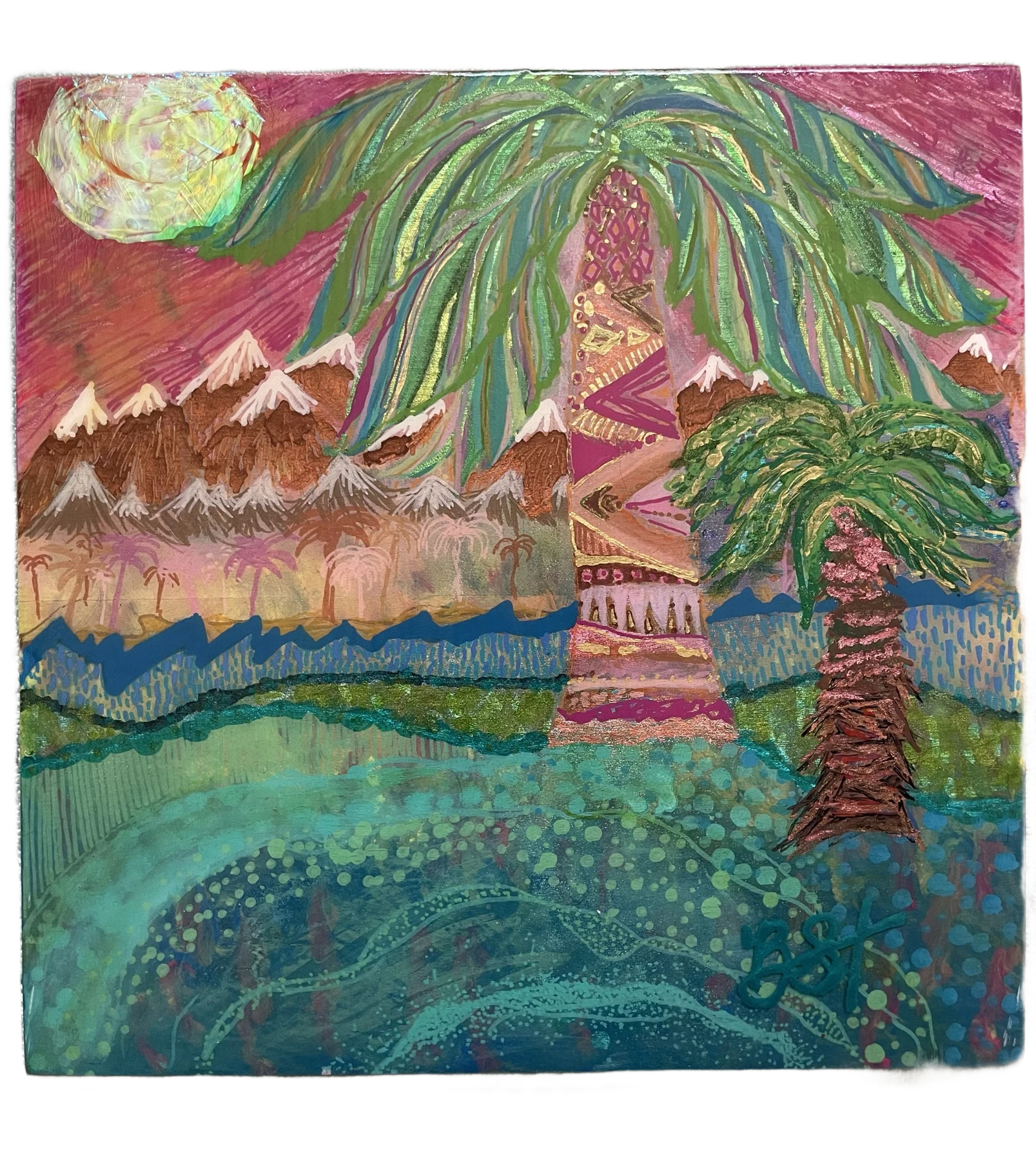 Palm oasis with mountains under a warm pink sky